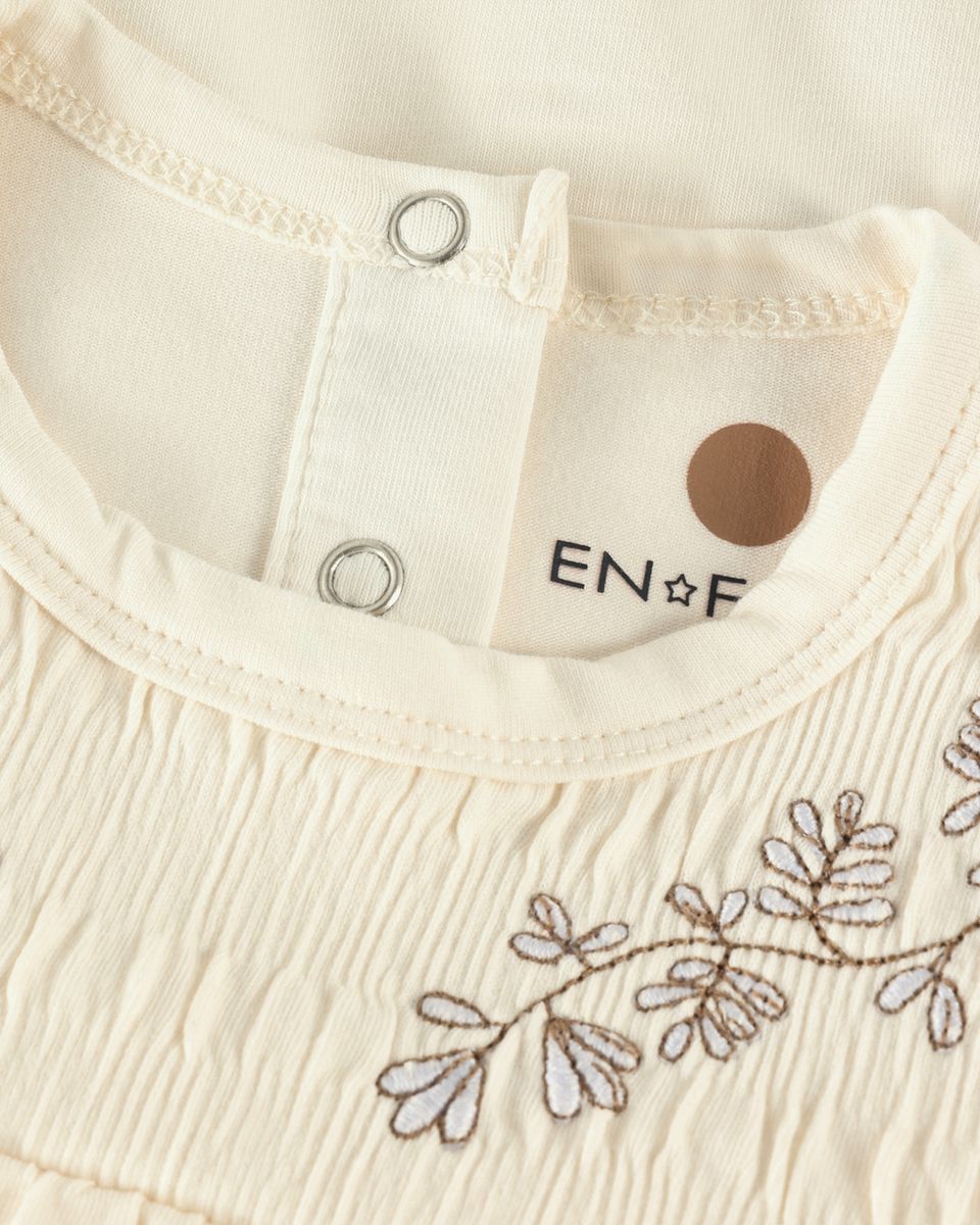 En Fant Body Med Broderi Eggnog